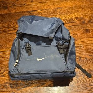Nike Navy Men's Backpack with White Logo and 5 sections.